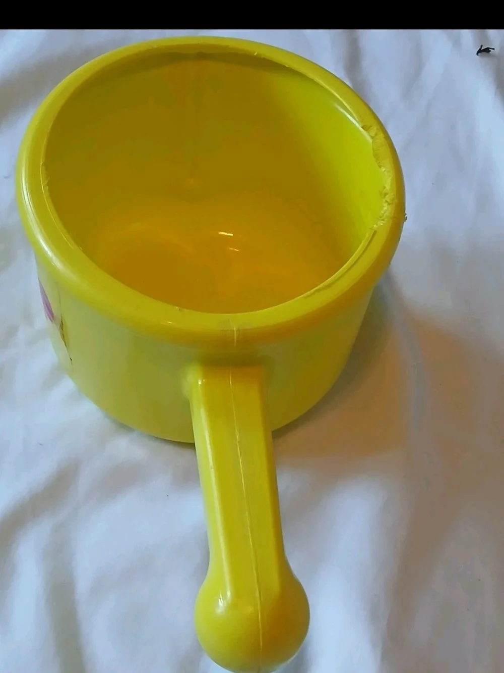The First Years Yellow Smiley Toy Cooking Pot with Handle for Ages 12-18 Months